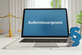 Foto: Laptop mit Anzeige Außensteuergesetz